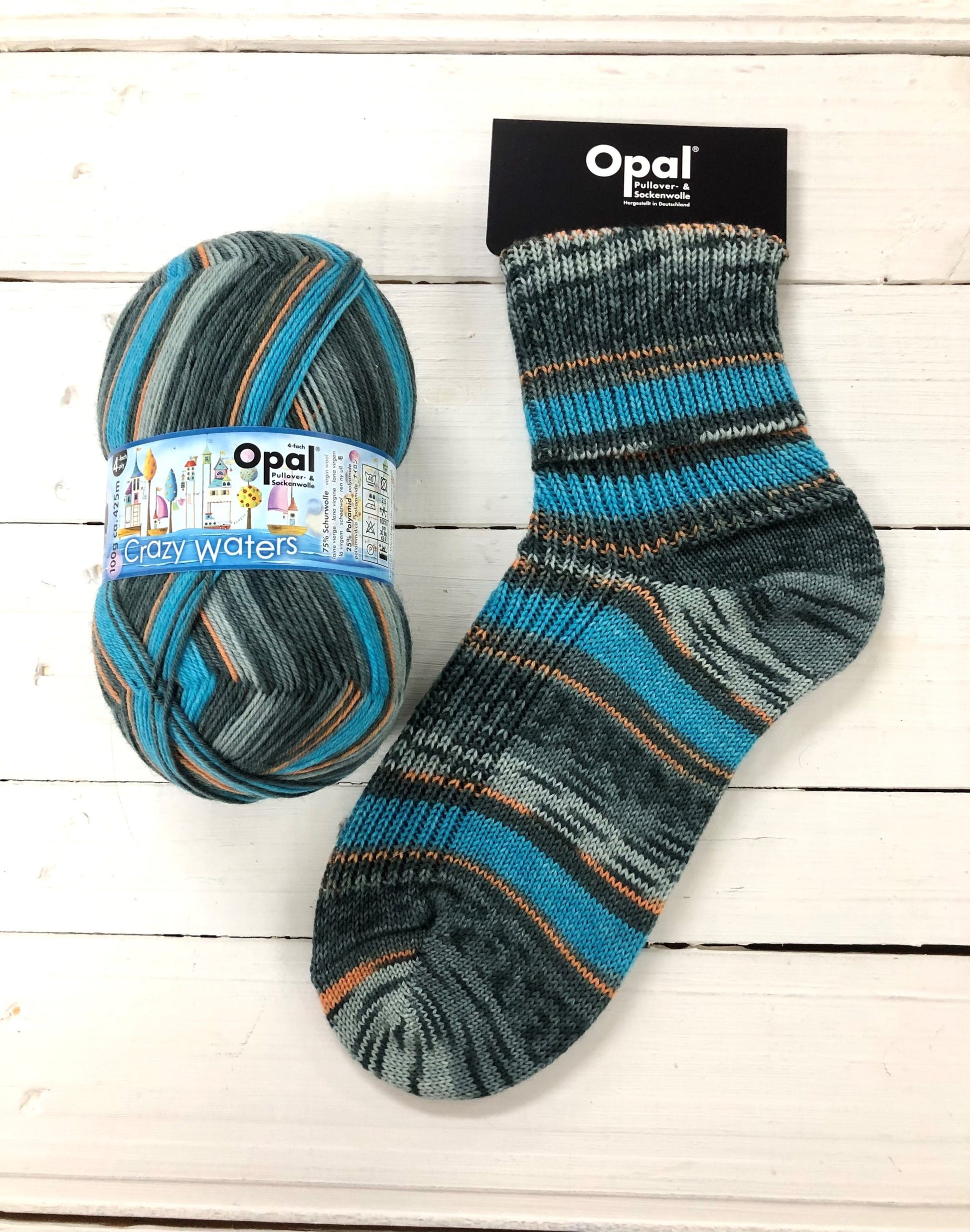 11311 - Blue, grey, black and orange self striping sock