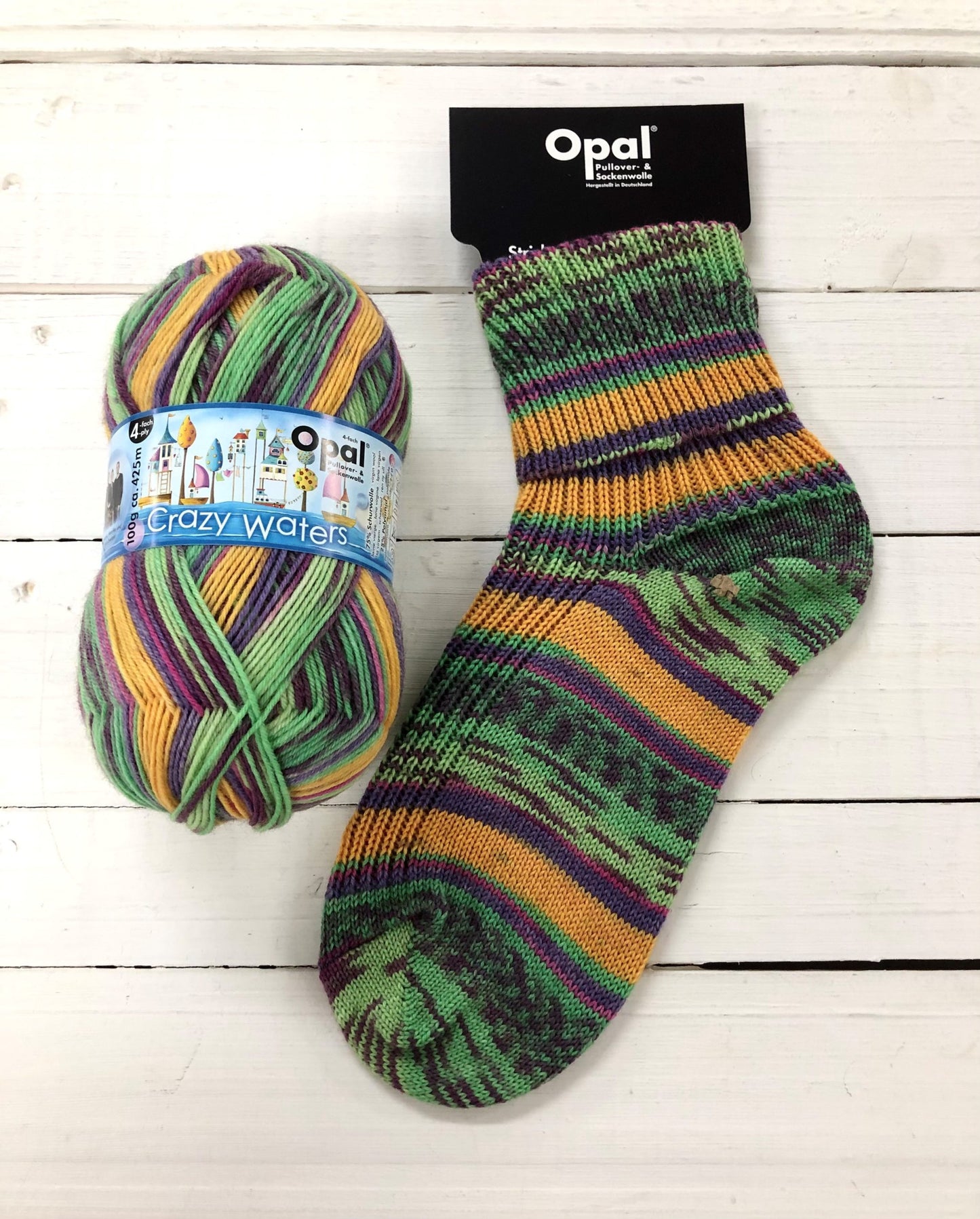 11313 - Green, yellow and purple self striping sock