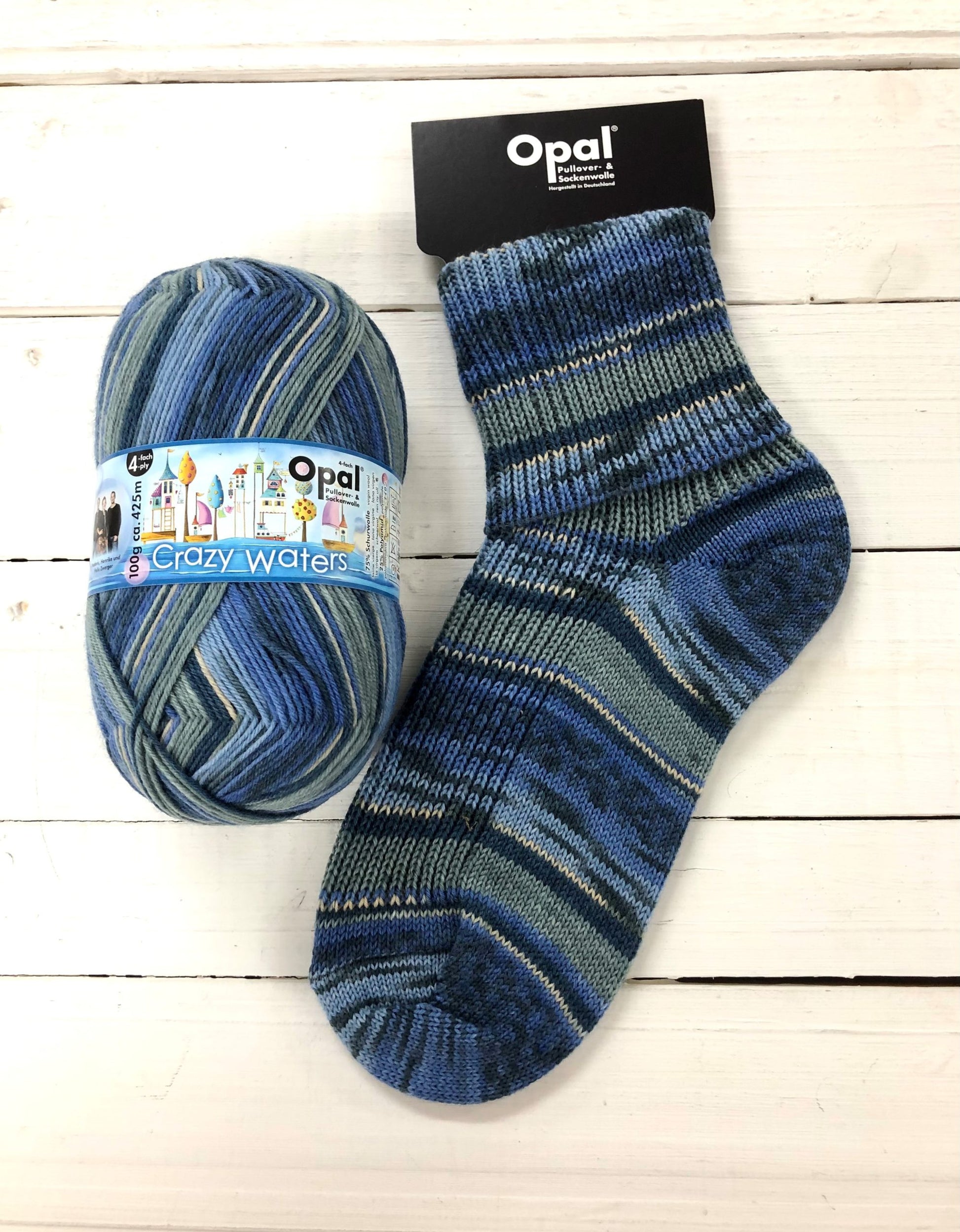 11314 - Shades of blue and grey self striping sock. 