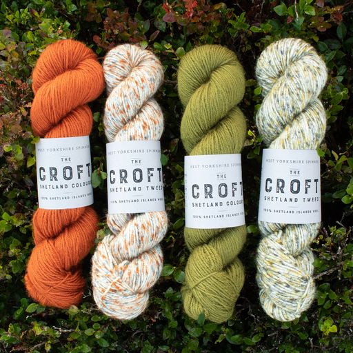 A collection of the The Croft DK collection - left to right Challister, Tangwick (not stocked), Graven and Scalloway placed on a hedge.