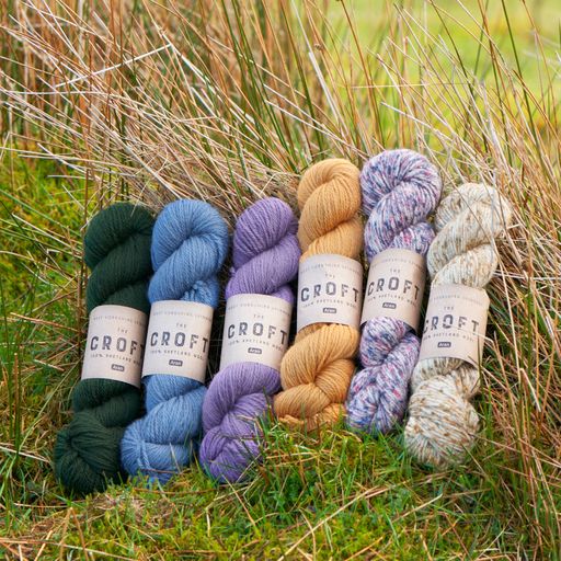 The stunning new croft collection with the colours (left to right) Delting, Kettlester, Moarfield, Tirvister, Virkie and Browland, propped up against long grass and moss
