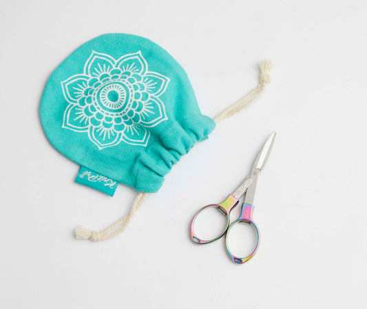 A pretty teal pouch with a small pair of folding scissors with rainbow colours