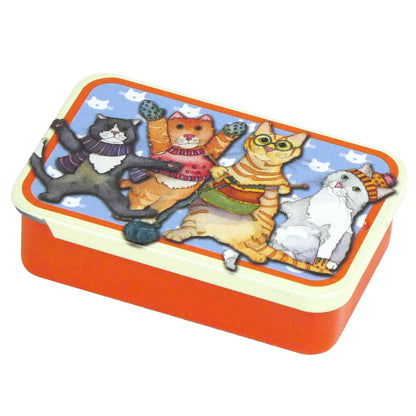 Miniature tin with kittens in mittens motif on blue background with cream on the lid edge and an orange base. 